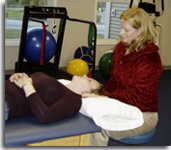 Jenn Mitchell works with patient using integrated manual therapy